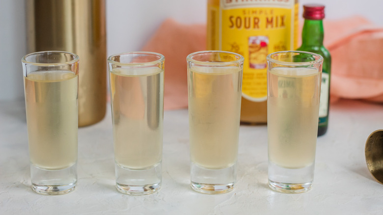 four glasses of green tea shots