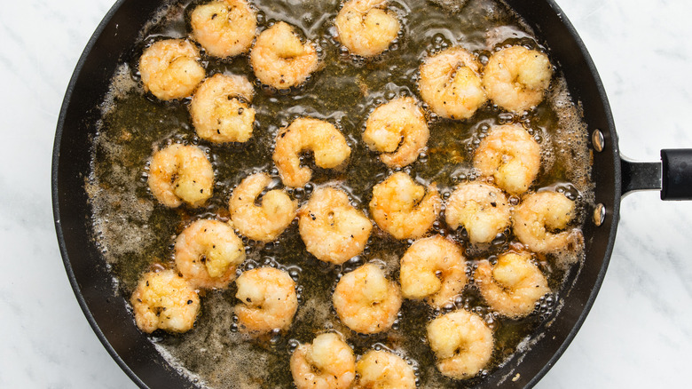 shrimp frying in pan