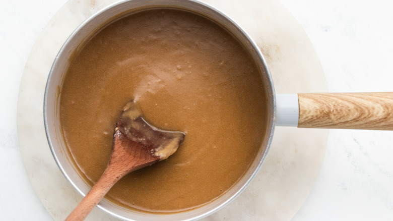 Beef gravy in saucepan