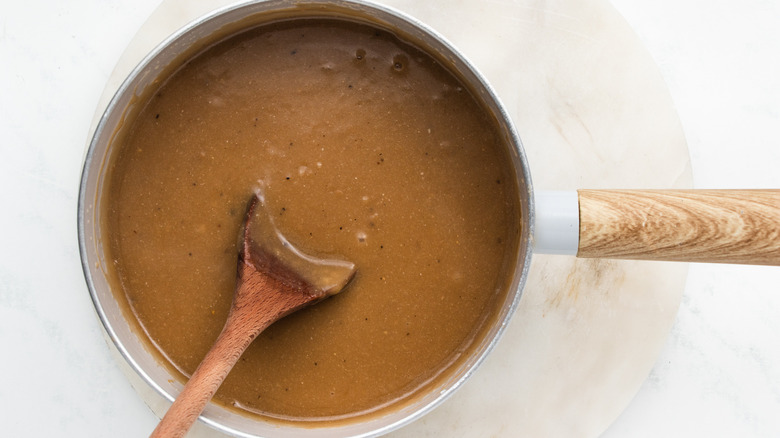 Beef gravy in saucepan