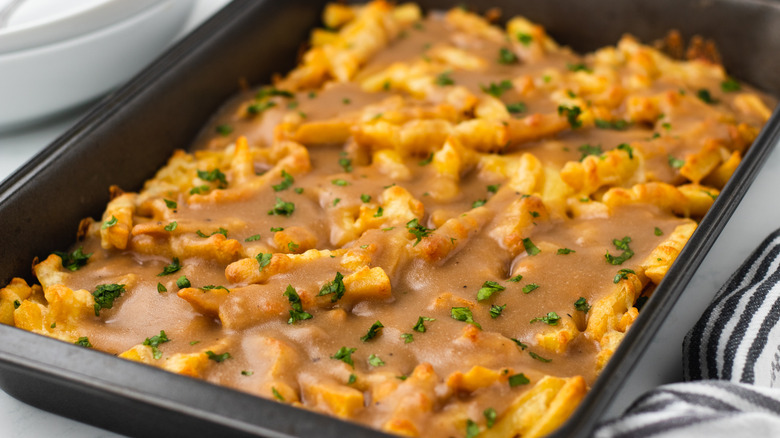 Disco fries with gravy in baking dish