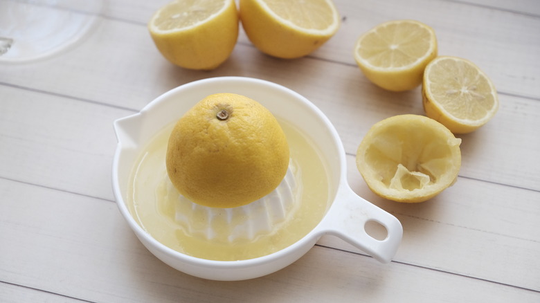 lemon half on juicer