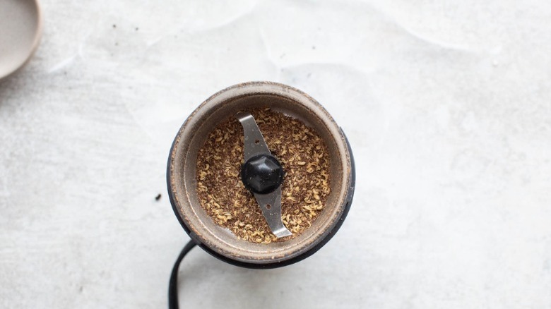 peppercorns in coffee grinder