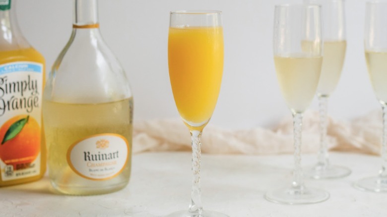 orange juice in champagne flute