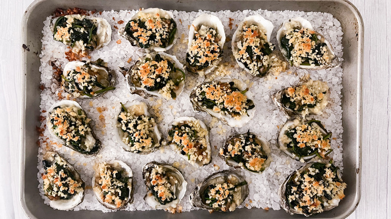 oysters Rockefeller on baking sheet