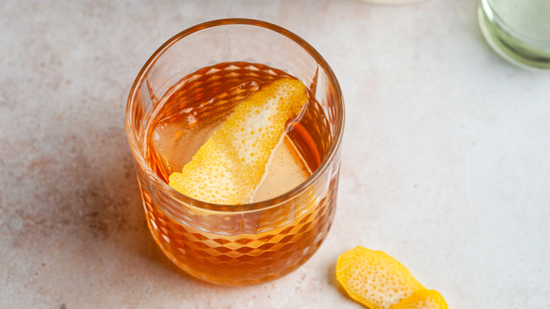 cocktail with lemon peel