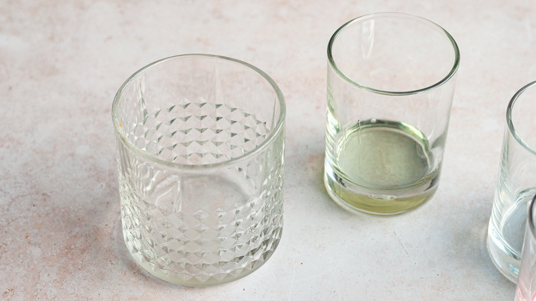 cocktail glasses sitting on counter