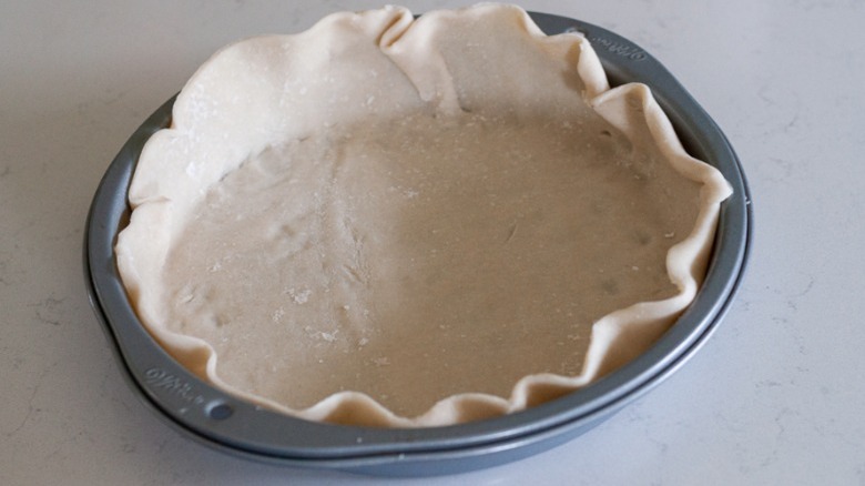 pie crust in pie pan before baking 