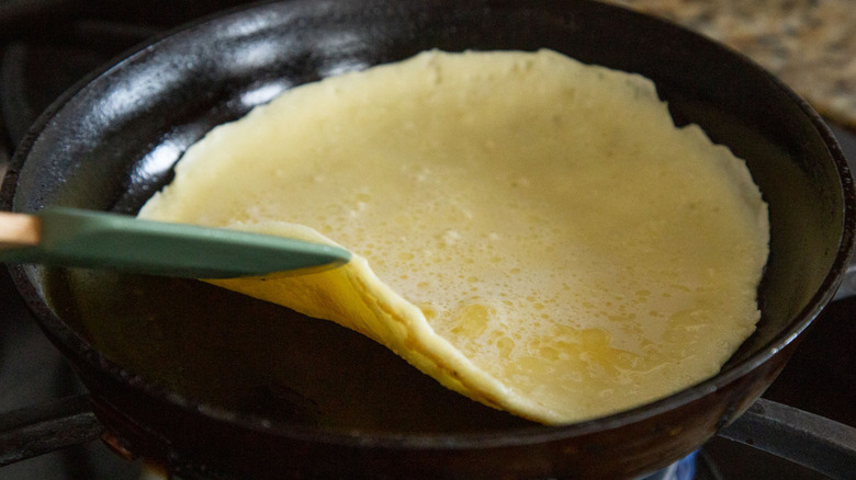 pancake cooking in skillet