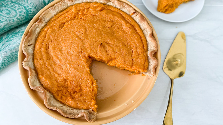 classic sweet potato pie in dish 