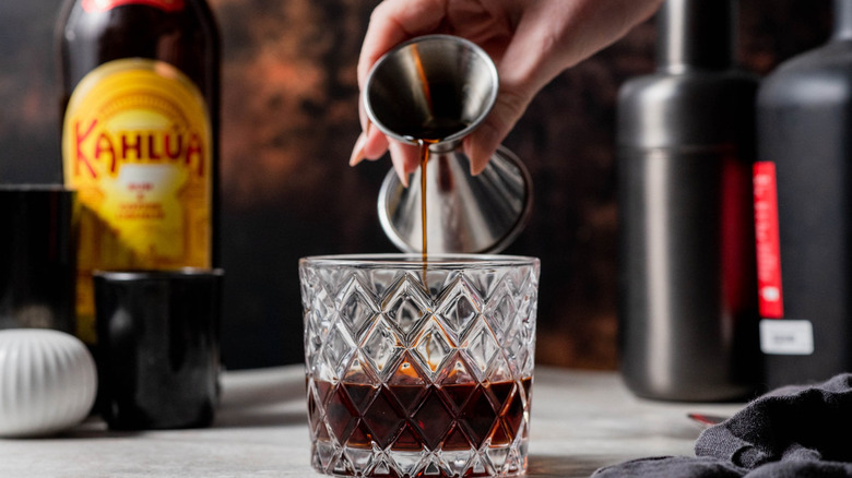 pouring coffee into glass