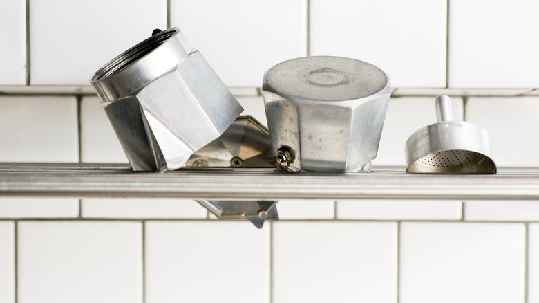 Moka pot on cleaning rack