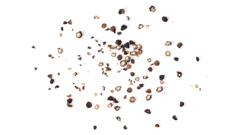 Black pepper on white background