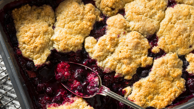 berry cobbler in pan