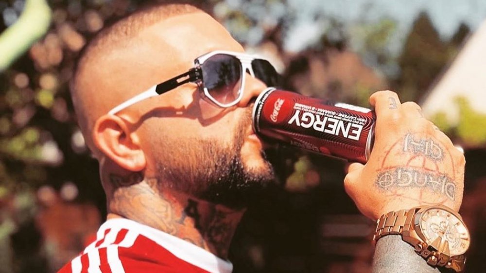 Man drinking Coke Energy