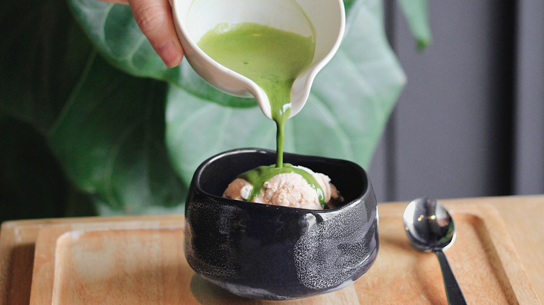 Matcha poured over ice cream