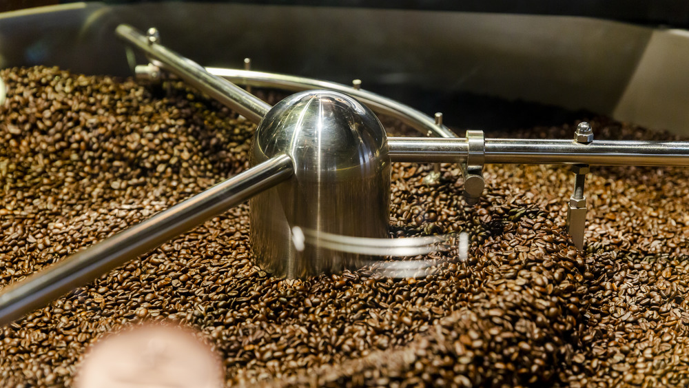 Coffee beans being processed