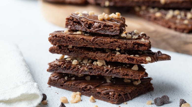 brownie brittle pieces stacked in a tower