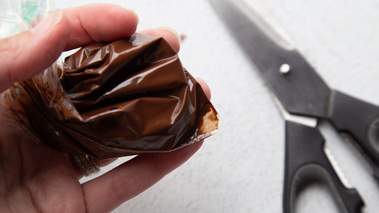 plastic bag filled with melted chocolate