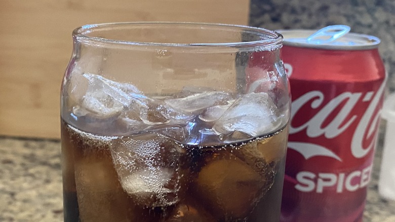 Bubbles rolling along ice in Coke Spiced