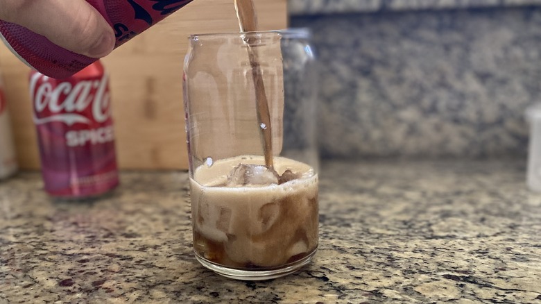 Coke Spiced Zero Sugar pouring