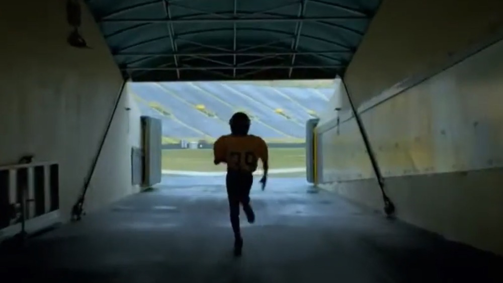 kid running down tunnel