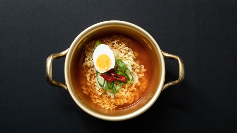 Egg and ramen in pot