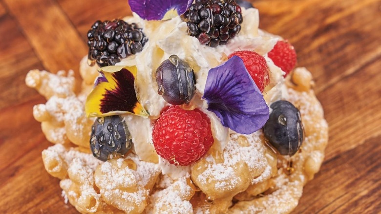 Dollywood berry funnel cake with petals