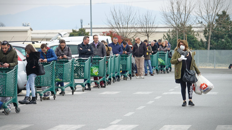 people waiting in long line