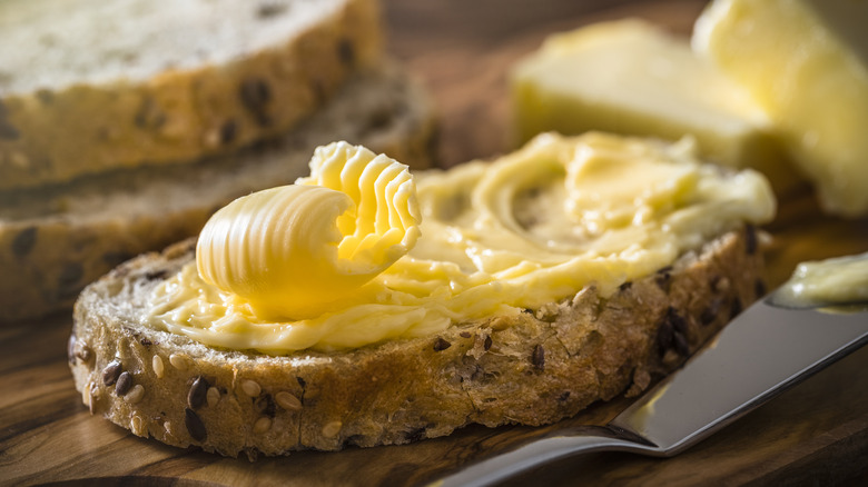 Butter on slice of bread