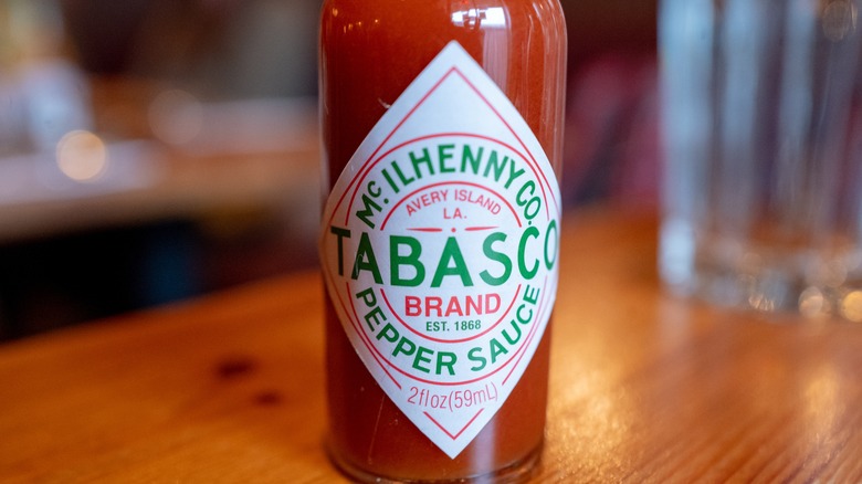 closeup tabasco bottle on table