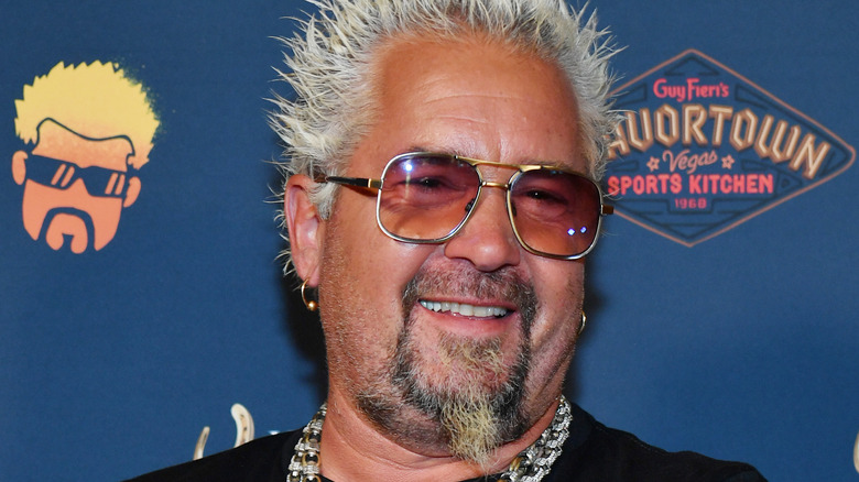 Guy Fieri smirking