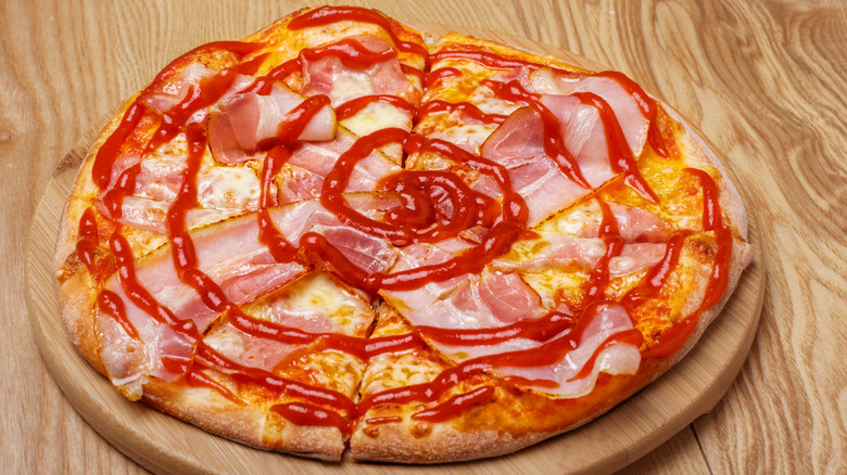 Pizza with bacon and ketchup