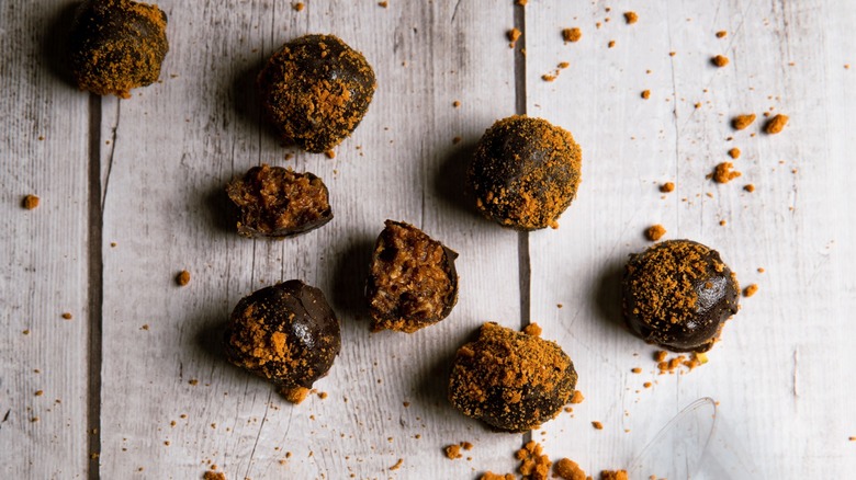 cookie butter truffles on grey wooden background