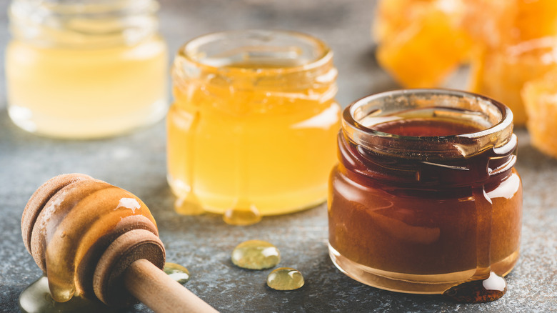 Assortment of honey in glass jars