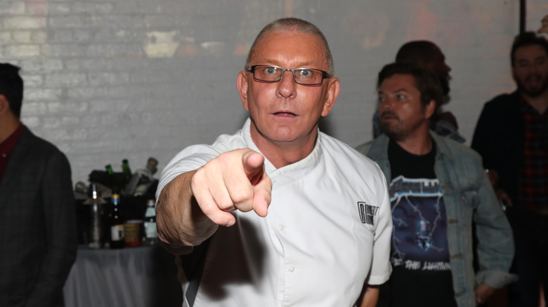 Robert Irvine points into camera