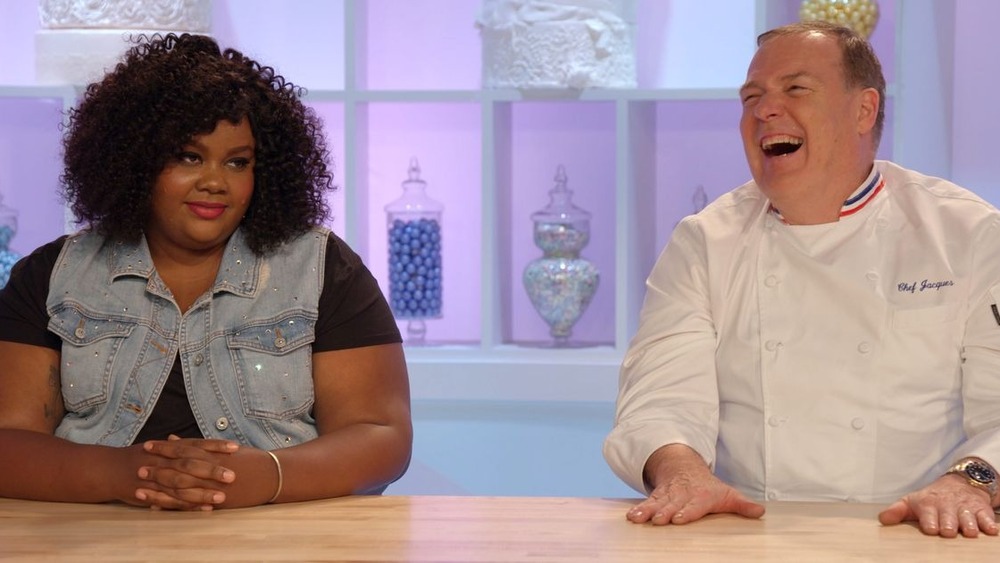 Nailed It screenshot showing Nicole Byer and Jacques Torres laughing