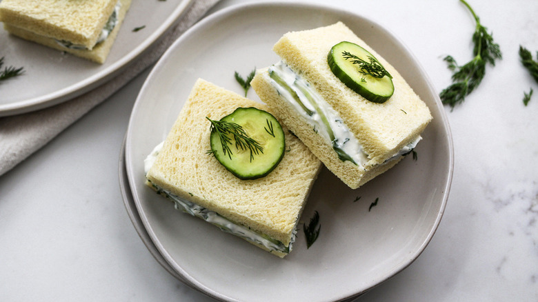 sandwiches with cucumber garnish