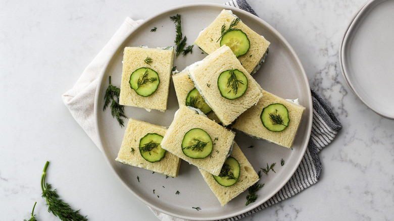 sandwiches with cucumber garnish