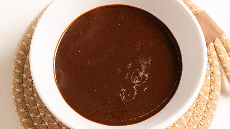 brown sauce in white bowl