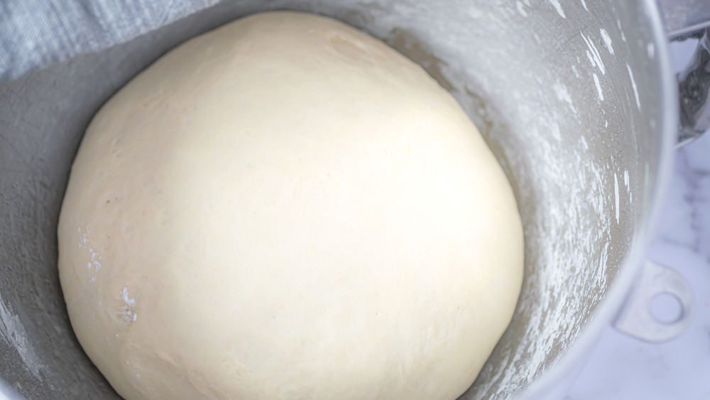 dough proofing in bowl for copycat Auntie Anne's pretzels