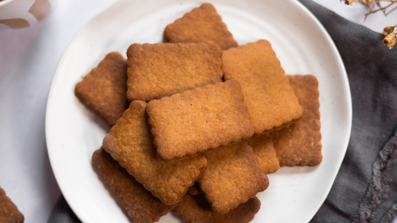 homemade biscoff speculoos cookies piled on white plate