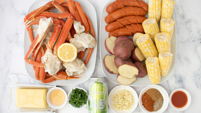 crab legs, potatoes, sausage, corn