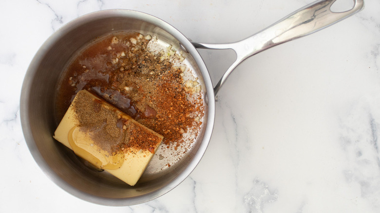 butter and seasonings in pan