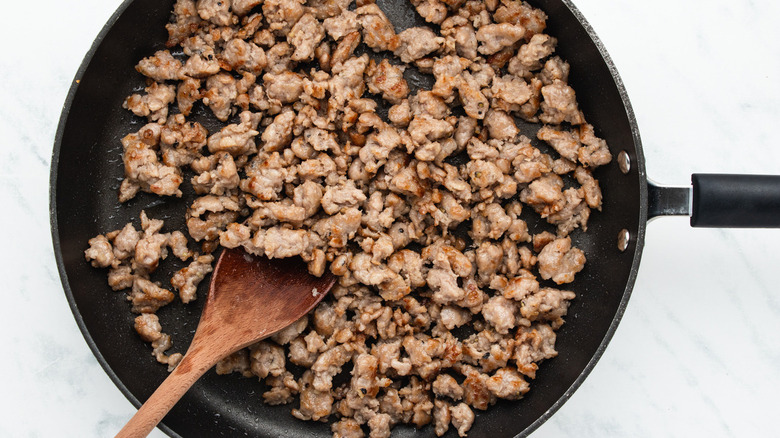 cooked sausage meat in pan