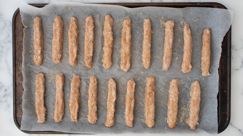 fry-shaped ground chicken on sheet