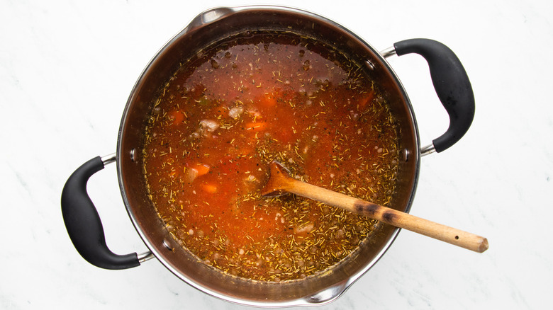 sausage lentil soup in pot