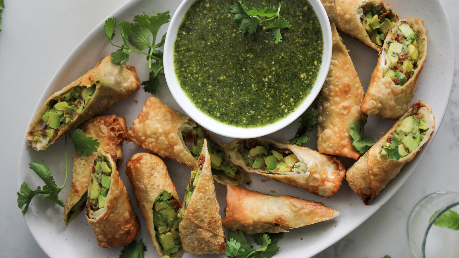 https://www.mashed.com/img/gallery/copycat-cheesecake-factory-avocado-egg-rolls-recipe/l-intro-1698353900.jpg