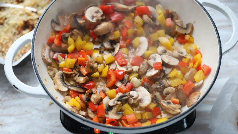 vegetables sauteed in a pan