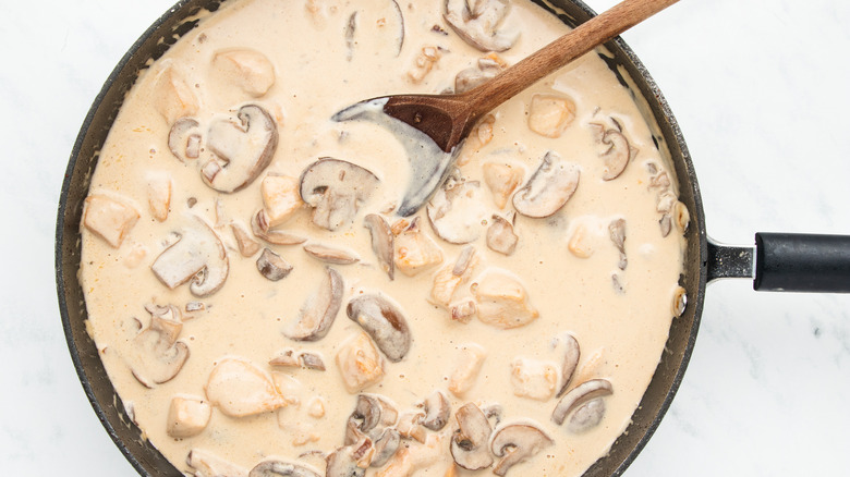 creamy mushroom sauce in pan